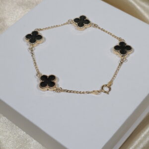 Pulso Trebol Espiga 4.15gr / 18.4cm / 1.5mm Electroestatico Negro Oro Amarillo 18K.