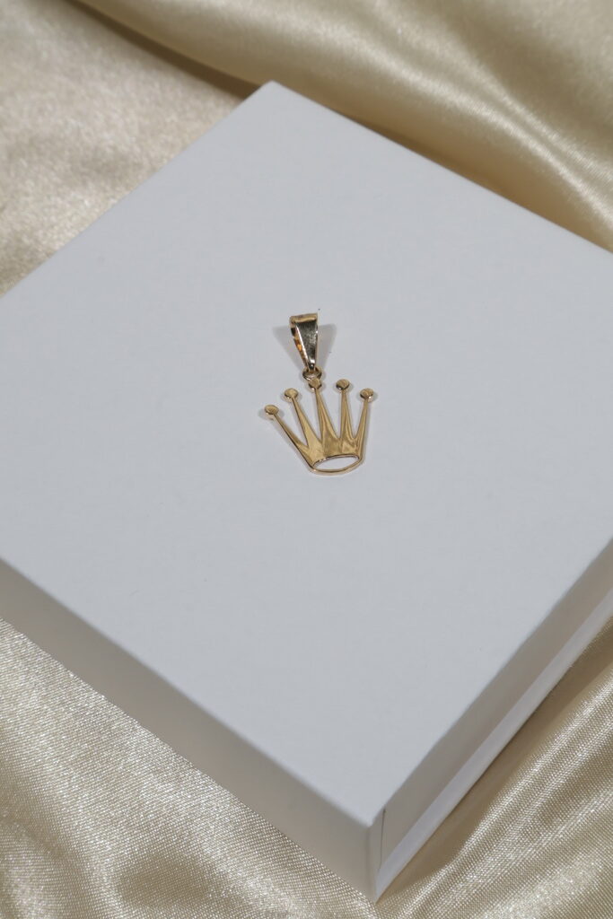 Dije Corona 1.35gr / 2.8cm / Oro Amarillo 18K.