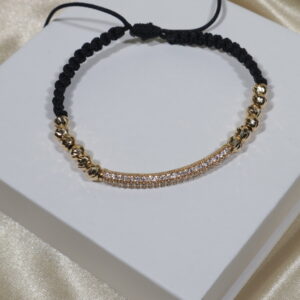 PULSERA NEGRA CILINDRO CURVO 5GR/5MM/ BOLAS DIAMANTADAS. / oro 18k