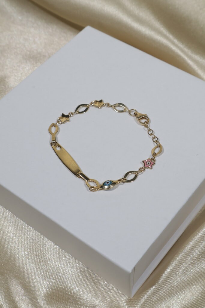 Pulso Bebé Placa Ojos Estrellados Misticos 2.95gr / 13.5cm-15cm / Oro Amarillo +4 18K .